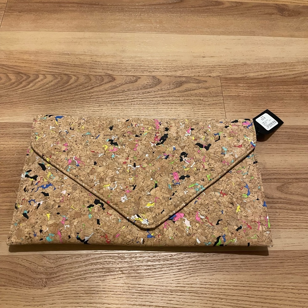 Tan multi-colored cork clutch. New with tags.
